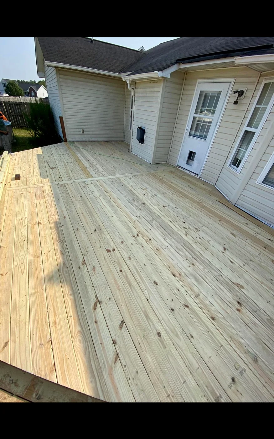 New pressure-treated wood deck